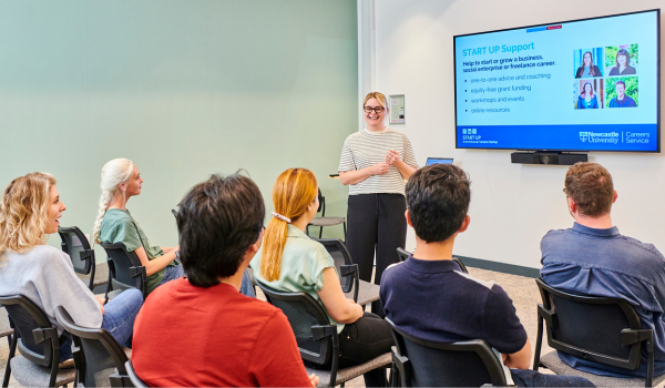A careers adviser working one-to-one with a student