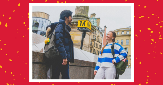 Image of two students standing outside Monument Metro station, on a red background with yellow specks