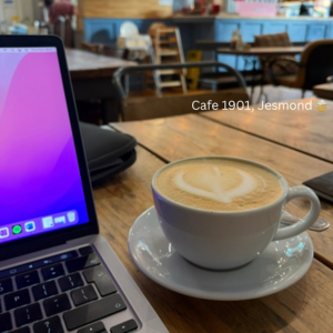Cafe 1901 Jesmond, mug of coffee and laptop