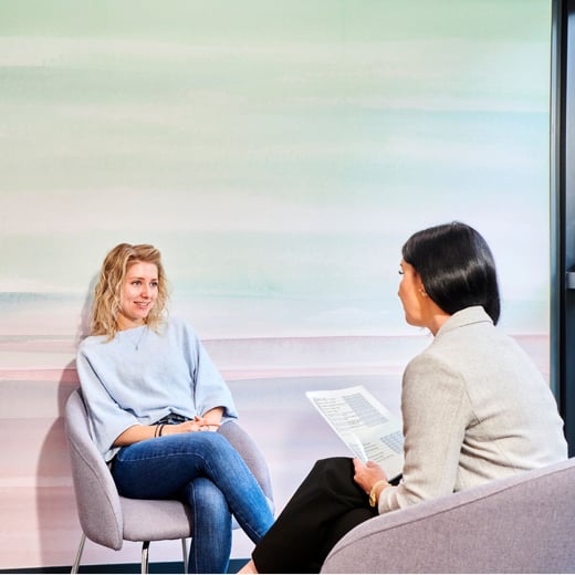 Student talking with adviser in King's Gate wellbeing room