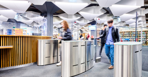 Students scanning smartcard to access library