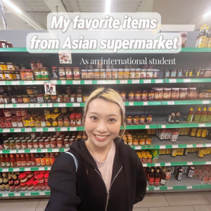 Yumeka at Asian supermarket, smiling at camera