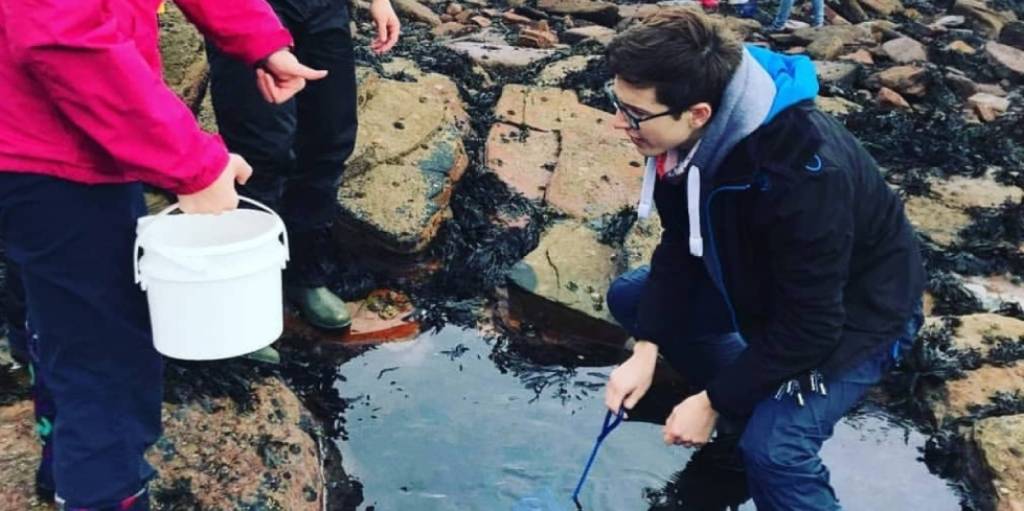 Newcastle Uni student Owen during a practical for his Marine Biology course