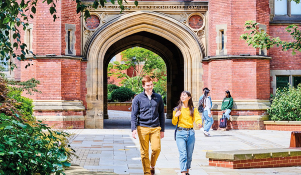 two students walking on campus