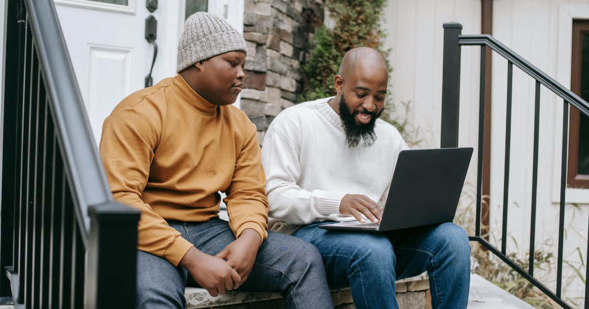 Man and son with laptop